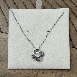 Elegant silver necklace with encircled center stone